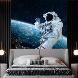 Фотошпалери флізелінові Космонавт у космосі над рідною планетою Земля (WP43)